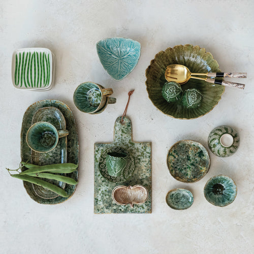 All green stoneware in the kitchen including our Stoneware Platter with Scalloped Edge with gold salad serving spoons. 