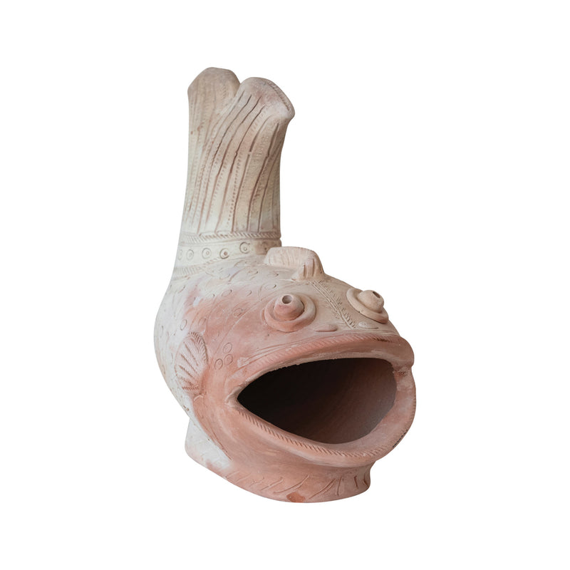 The Terracotta Fish Shaped Container opening. 