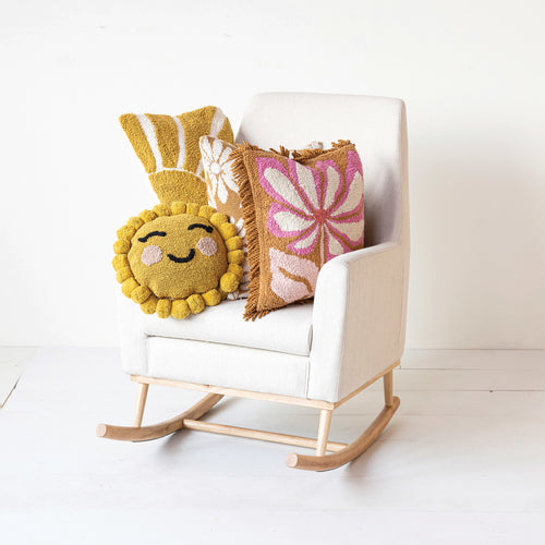 Cotton Tufted Lumbar Pillow with Sun and other bright, fun tufted cushions in a child nursery. 