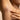Women applying deodorant to her underarm. 