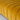 Close-up of a yellow upholstered bench with a plain background