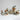 Collection of ceramic dishes and mugs with animal illustrations on a white surface.