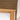 Close-up of a wooden table corner with a neutral background