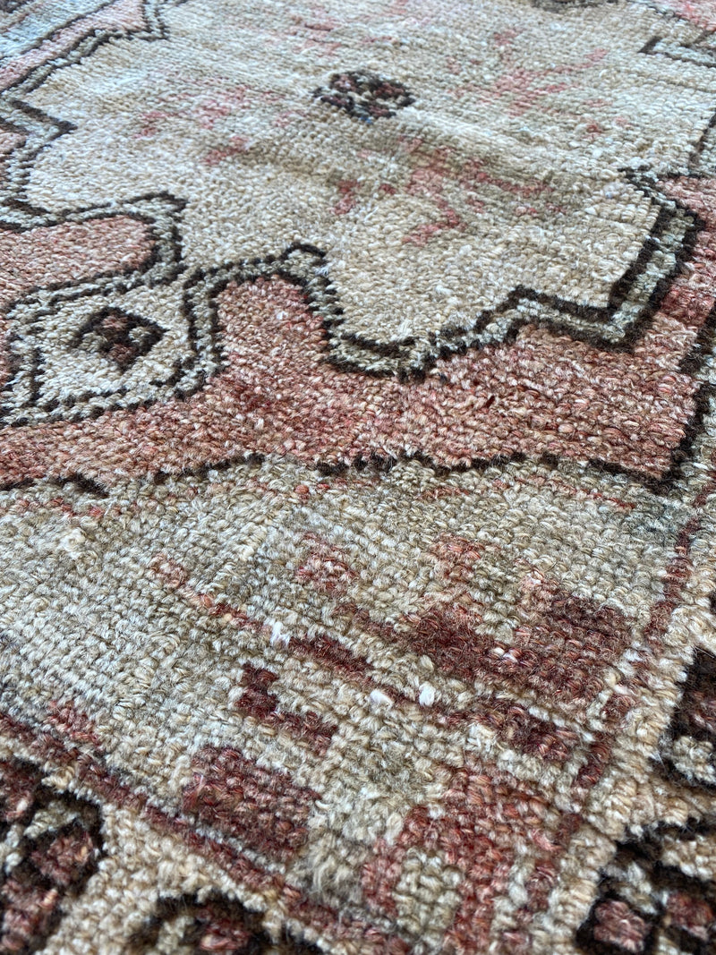 Close up detail of the hand-woven Turkish rug. 