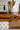 Kitchen counter with toaster, wooden cutting boards, and jars of honey.