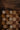 Wooden checkers board with pieces on a wooden surface
