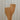 Two wooden spatulas on a corrugated metal background