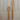Two wooden spatulas on a textured white surface