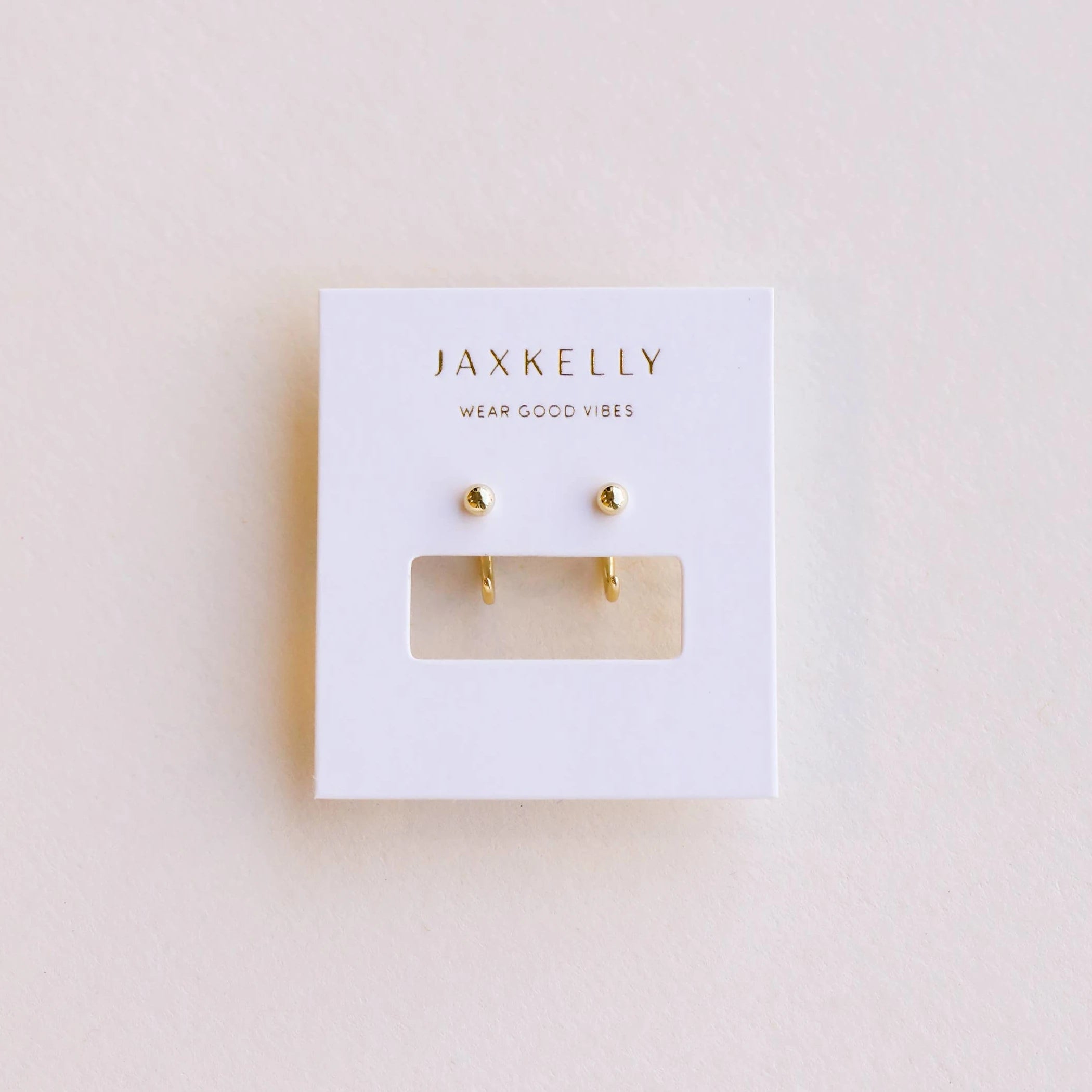 JaxKelly gold ball huggies earrings. 