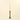 Large brass candlestick with white candle
