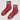 Terracotta socks with white stripes and 'Le Bon Shoppe' branding on a light gray background