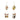 Set of four decorative metal bar cart ornaments with various items on a white background