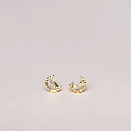 Gold crescent moon stud earrings. 