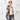 A model wearing the Pansy Flower Short Kimono over top of a white v-neck t-shirt, paired with a medium wash denim jeans.