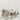 Collection of ceramic dishes and cups on a light background