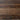 Close-up of a wooden surface with visible grain and texture