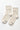 Pair of light beige socks with brand logo on a white background