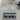 A 4-pack of SaltSpring Kitchen Co samplers in a blue cardboard box, displayed on a light countertop with a blurred kitchen background.
