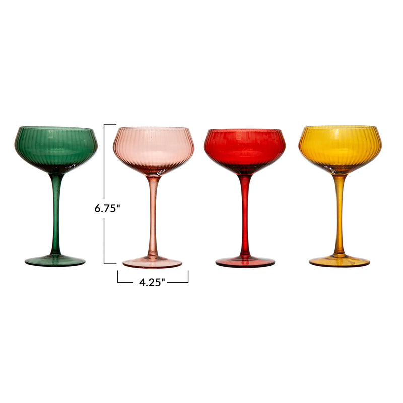 Measurements of the stemmed champagne coupe glass. is 6.75" high by 4.25" wide. 