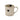 Beige mug with black heart designs on a white background
