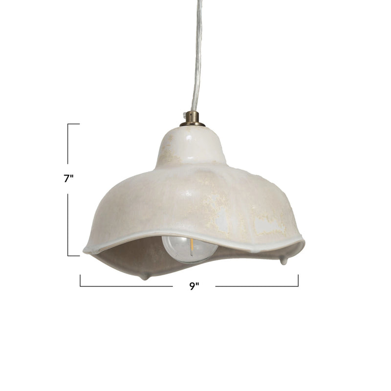 Stoneware pendant lamp with curved edges measures 7 inches high and 9 inches wide. 
