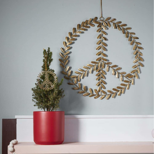 Olive Leaf Ornament and Wreath in Gold Finish. above fireplace mantel. 