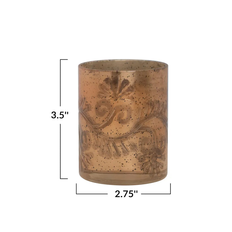 Votive candle holder in an antique copper finish measures 3-inches high by 3-inches wide. 