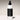 White bottle of 'leave-in' conditioner with black label on a gradient background