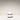 White deodorant container with black label on a light beige background