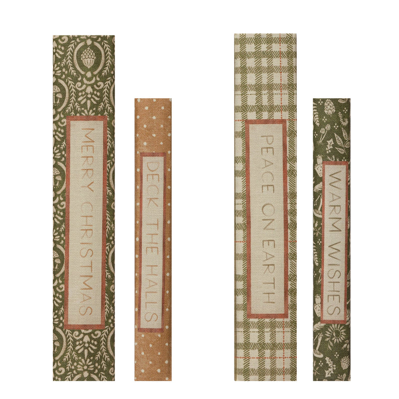 Four unique canvas covered book storage boxes with holiday wishes printed along the spine.