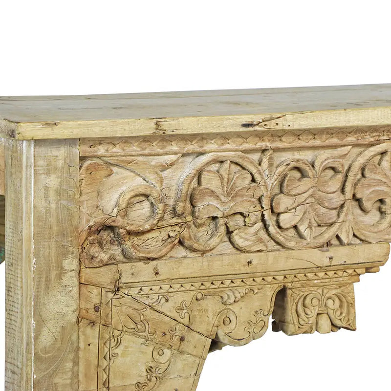 Corner details of salvaged hand carved console table. 