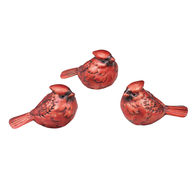 Three styles of red ceramic cardinals.
