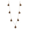 Natural beehive garland on jute string accented with wooden beads. 