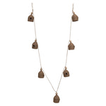 Natural beehive garland on jute string accented with wooden beads. 