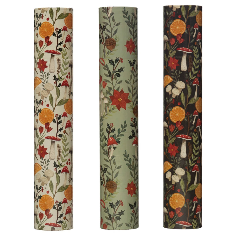 Three styles of Matchbox tubes with holiday foliage patterns.