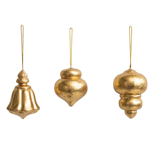 Three different styles of paper ornaments with an antique golden finish.