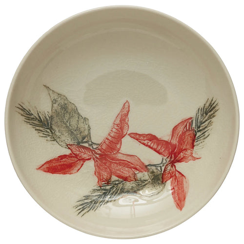 Debossed stoneware bowl with poinsettia in a natural off-white color with red and green.