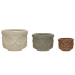 Three sizes of the decorative stoneware santa containers. 