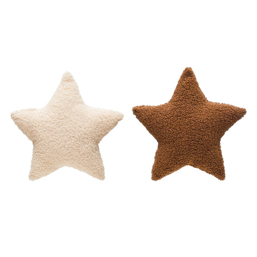 Faux sherpa star shaped cushion available in the colors cream and brown. 
