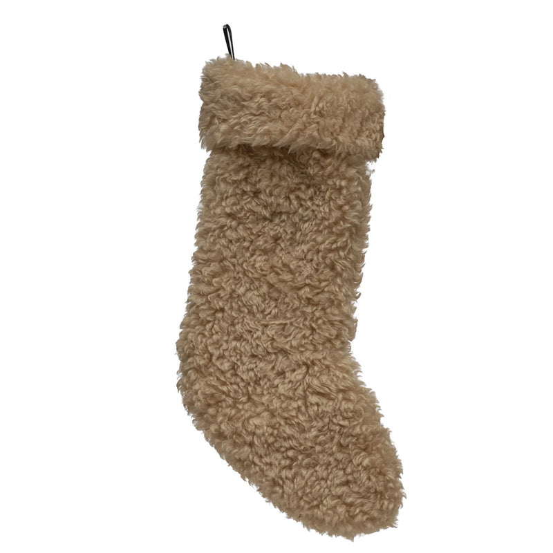 Soft cream colored faux sherpa stocking.