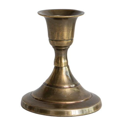 Cast aluminum taper holder with an antique brass finish. 