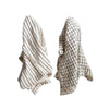Two cotton tea towels, one striped and one with a grid print.