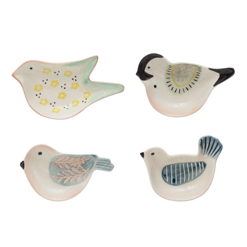 Four styles of decorative stoneware dishes shaped as different birds.