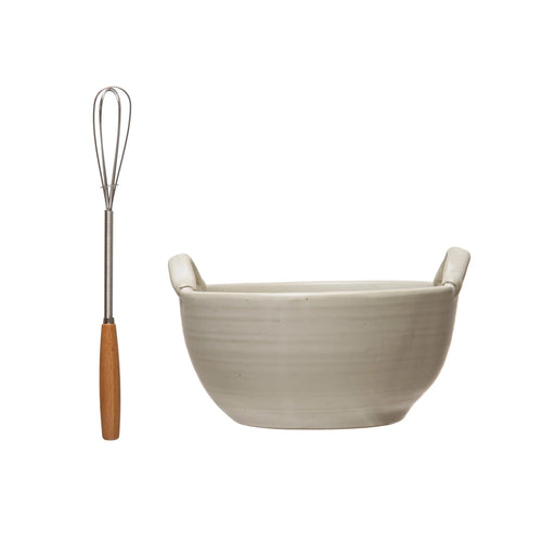 Stoneware batter bowl set and a metal whisk with wooden handle.