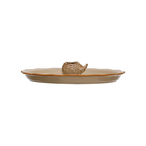 Side view of our adorable stoneware plate with hedgehog toothpick holder.