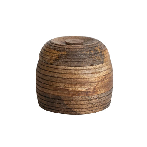 Carved mango wood container with lid, burnt wood finish.