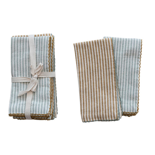 Cotton napkins with stripes, coming in a pack of four with two different colors, scalloped edges. 