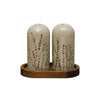 Debossed stoneware floral salt and pepper shakers with acacia wood tray.
