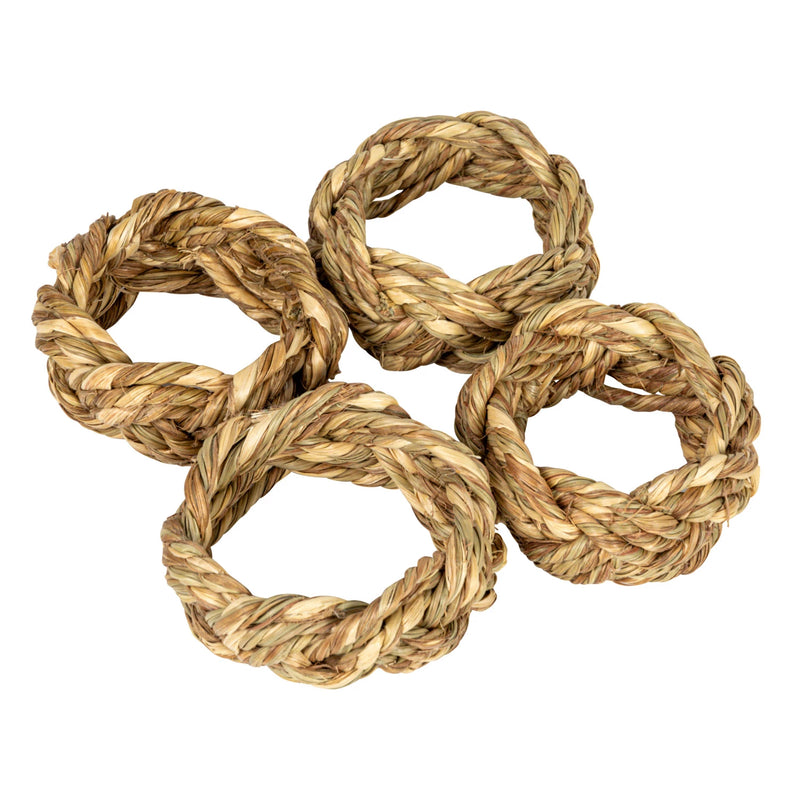 Four braided napkin rings made out of seagrass.
