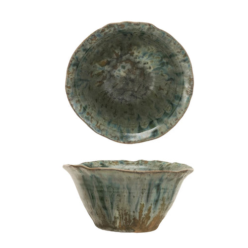 Stoneware bowl with reactive crackle glaze in a green color.